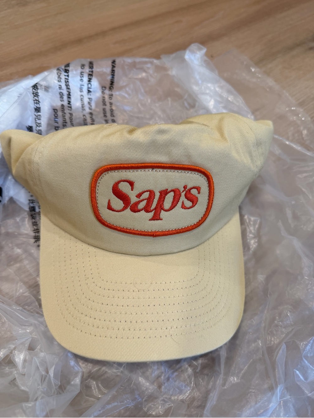 Sap’s Cream Baseball Cap with Orange Logo
